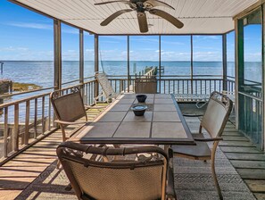 Outdoor dining - Grey Heron | Waterfront Home w/ Dock, Kayak Launch, Screened Porch, Epic Sunsets & Pet Friendly (Chincoteague Island)
