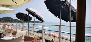 On the beach, sun loungers