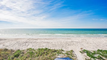 On the beach, sun loungers, beach towels