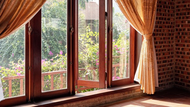 A room with a large window, wooden shutters, and a tiled floor. - Tamcoc Ngoc Linh Homestay (Nam Hoa Lu)
