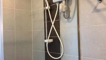 Hair dryer, towels, soap, shampoo