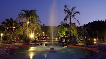 2 outdoor pools, open 6:00 AM to 8:00 PM, pool loungers