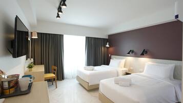 Minibar, desk, blackout drapes, soundproofing
