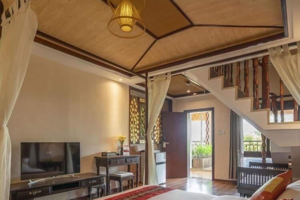Suite exclusive, non-fumeur | Rideaux d’obscurcissement, accès au Wi-Fi (inclus), literie fournie