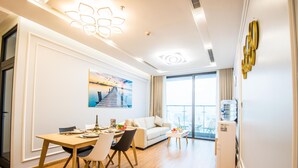 Superior Apartment, 1 Bedroom | Living area | 55-inch Smart TV with cable channels, TV - 22HOUSING Apartment Vinhomes Metropolis (Hanoi)