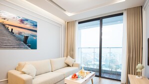 Apartment, 3 Bedrooms | Living room | 55-inch Smart TV with cable channels, TV - 22HOUSING Apartment Vinhomes Metropolis (Hanoi)