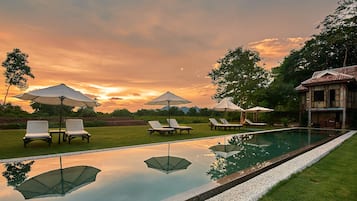 2 outdoor pools, pool umbrellas, pool loungers