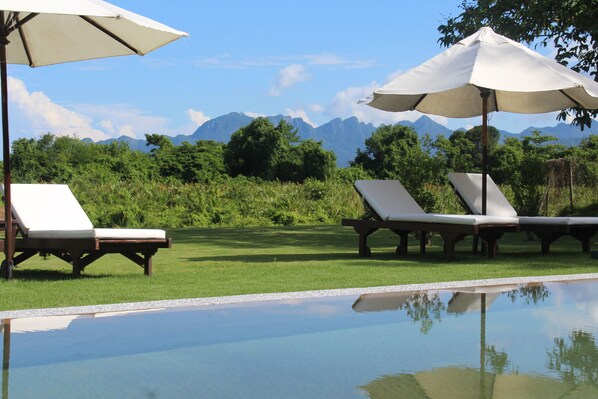 2 outdoor pools, pool umbrellas, sun loungers