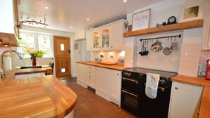 Oven, stovetop, high chair, cookware/dishes/utensils