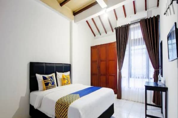 Estudio Deluxe | Escritorio, wifi gratis y ropa de cama 
