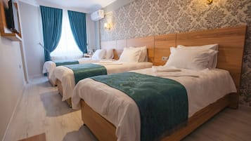 Basic Triple Room | Premium bedding, memory-foam beds, minibar, in-room safe