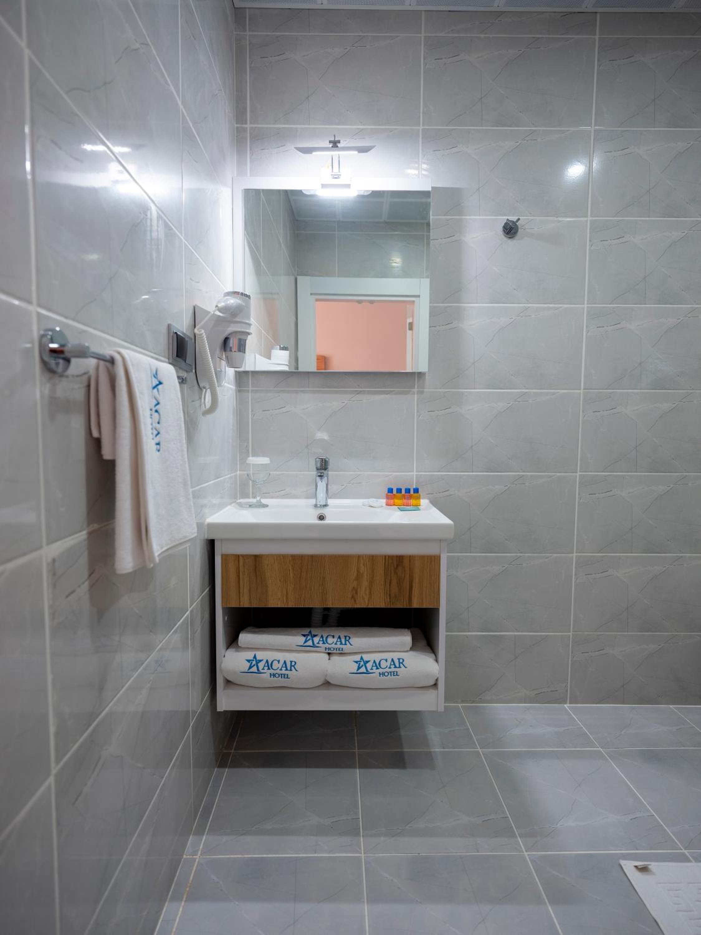 shower, free toiletries, hair dryer, slippers