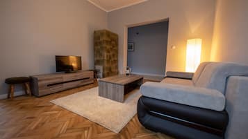 Apartamento | Sala de estar | Una televisión de pantalla plana