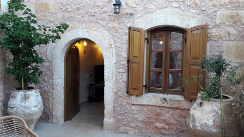 Villa with garden, inneryard and terrace with a view to Talean Mountains