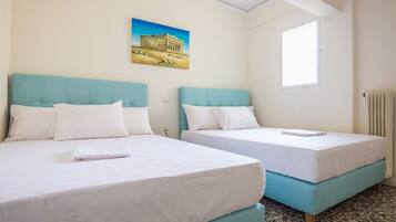 3 habitaciones, tabla de planchar con plancha, wifi y ropa de cama