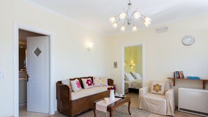 Apartment, 1 Bedroom | Living area | Flat-screen TV - Karitas Place (Corfu)