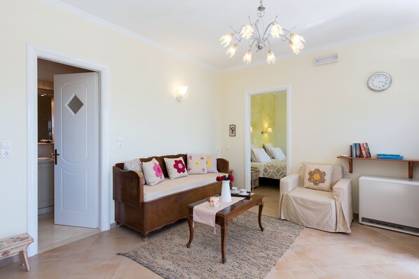 Apartment, 1 Bedroom | Living area | Flat-screen TV