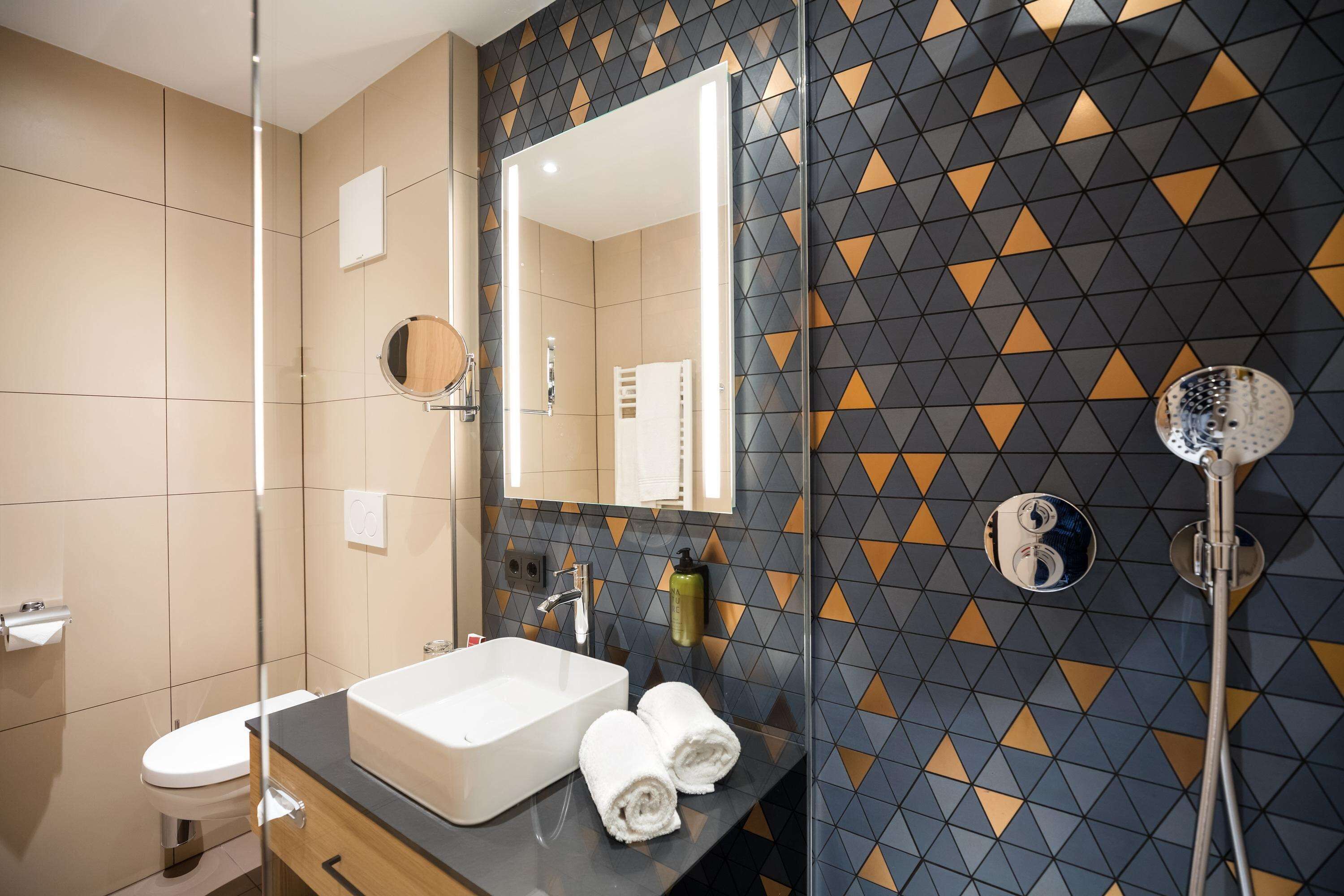 shower, free toiletries, hair dryer, bathrobes