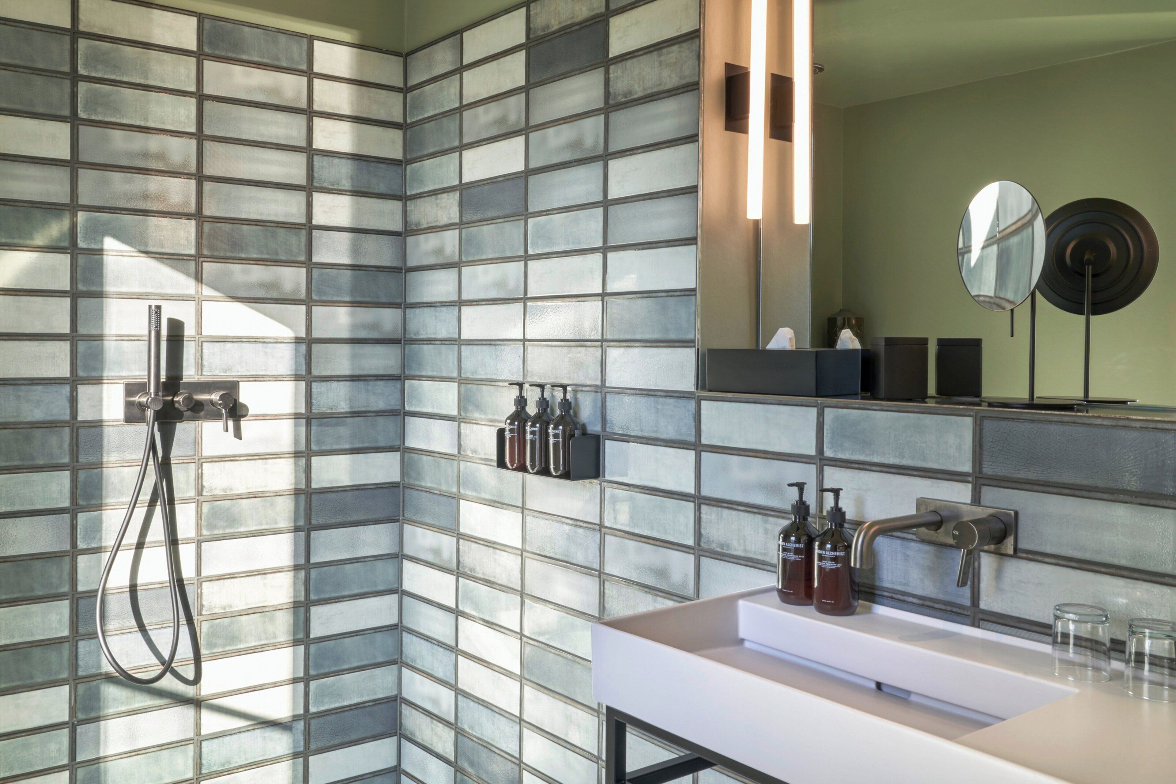 premium room, 1 king bed, non smoking | bathroom | hair dryer, towels, soap, shampoo