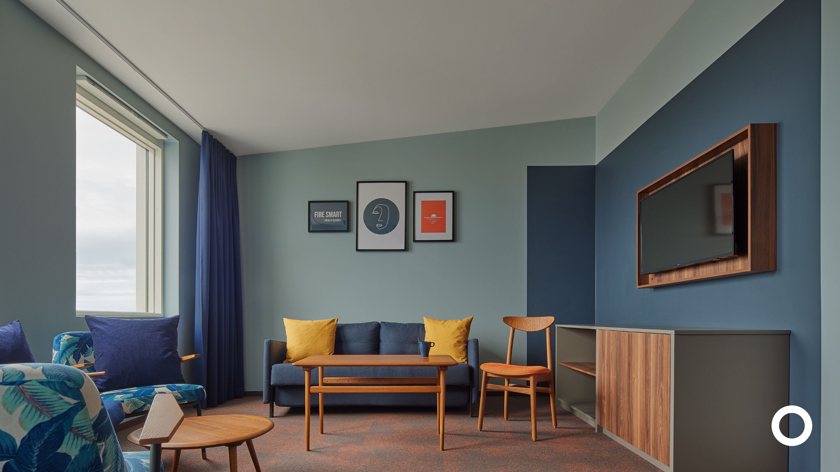 suite with spa access | living area | flat-screen tv