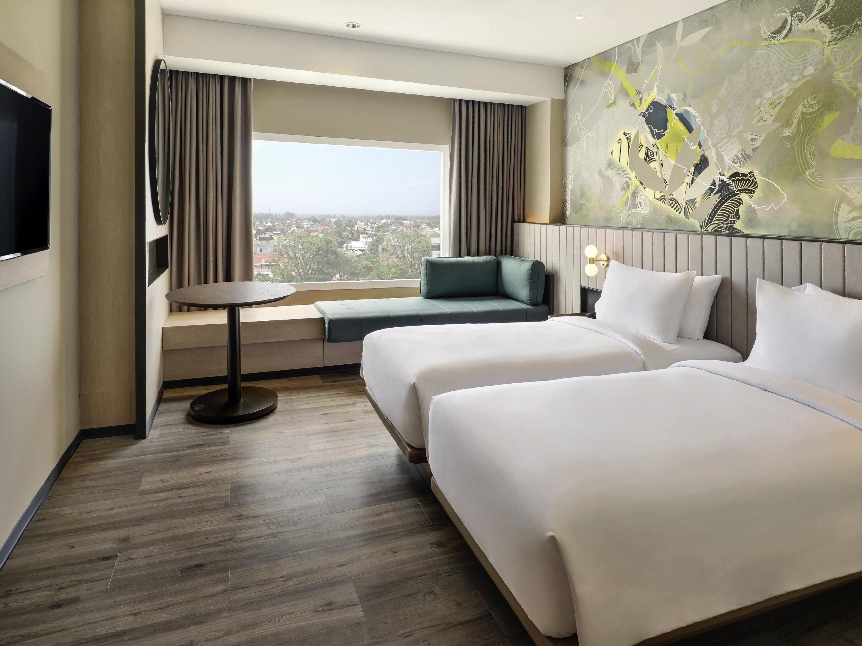 Premium bedding, pillow-top beds, minibar, in-room safe