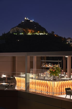 Rooftop bar, pool views, open daily