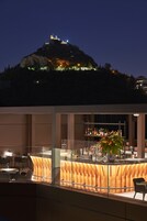 Rooftop bar, pool views, open daily