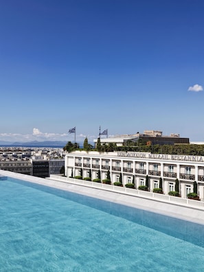Seasonal outdoor pool, pool umbrellas
