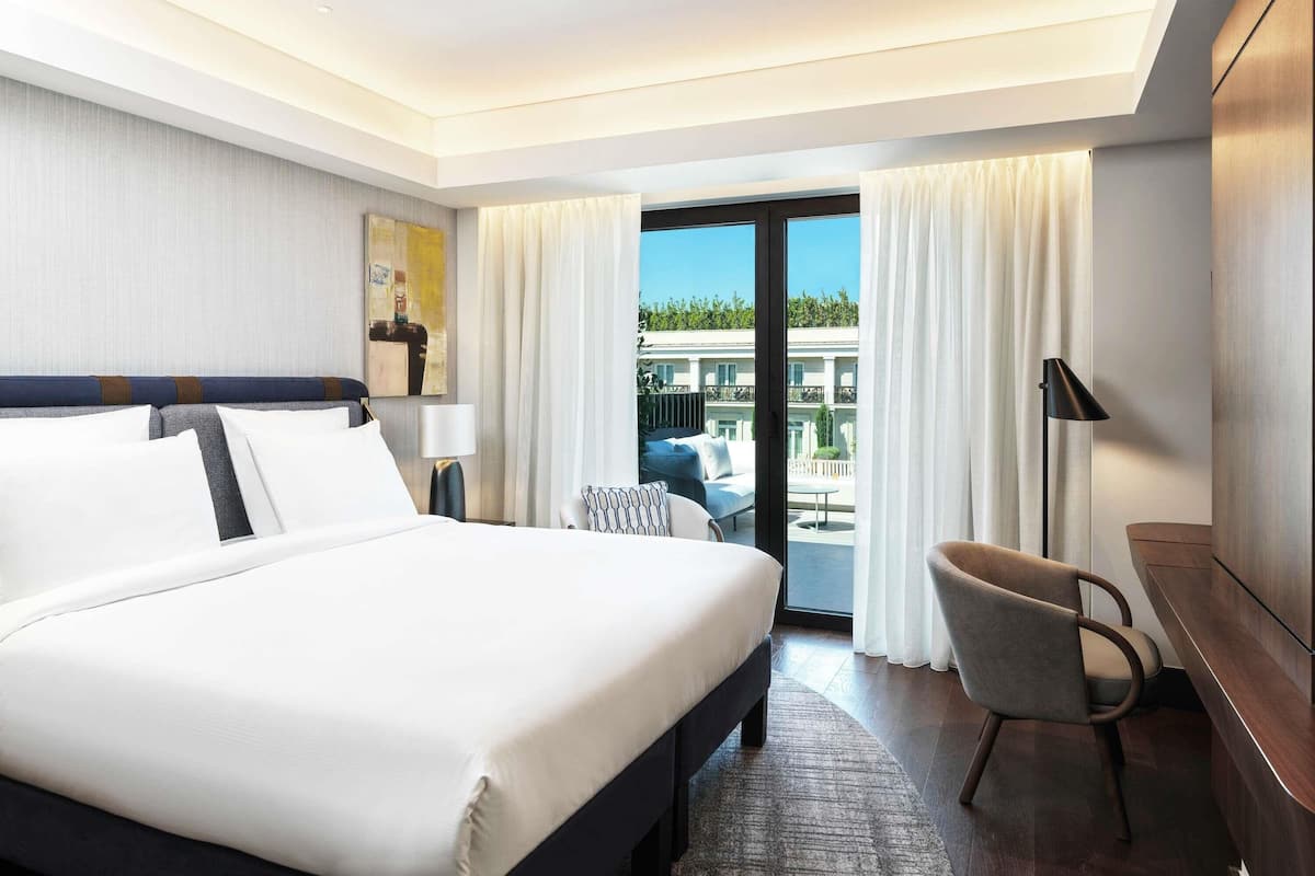 Chambre Deluxe, 1 très grand lit, balcon | Literie de qualité supérieure, couette en duvet d'oie