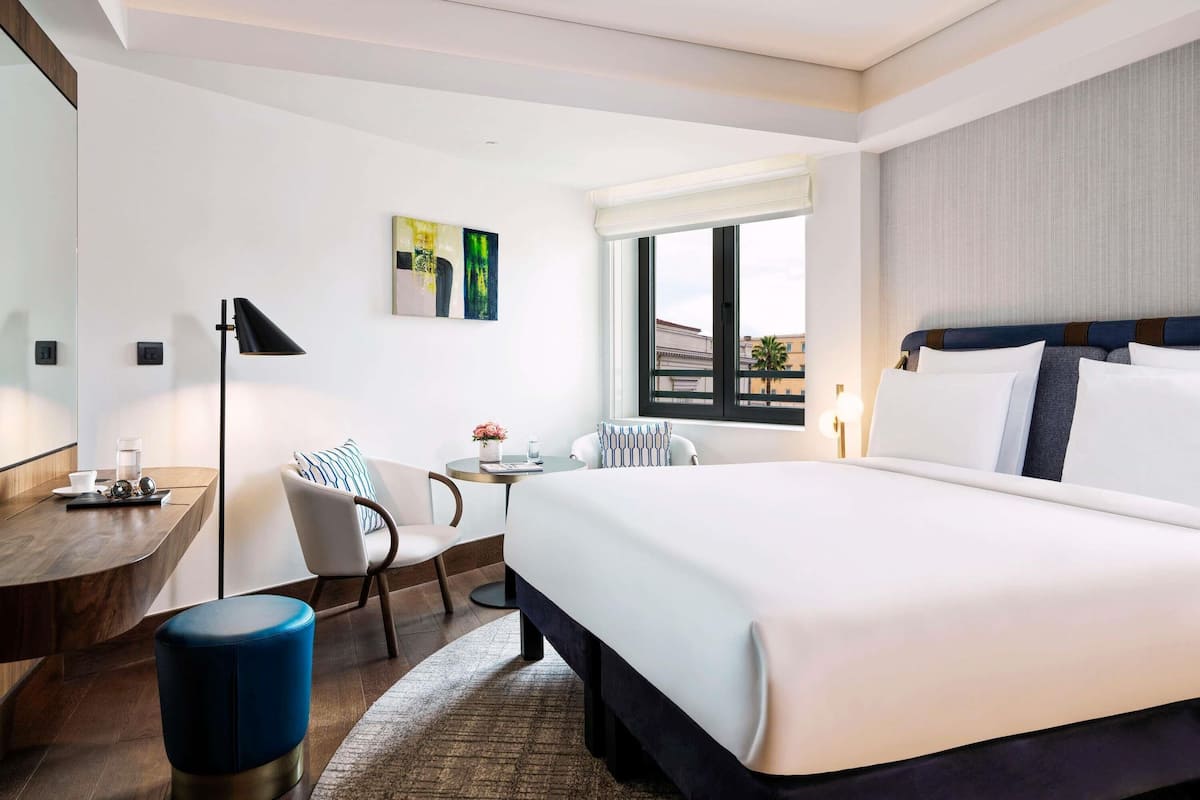 Premium bedding, down comforters, Select Comfort beds, minibar