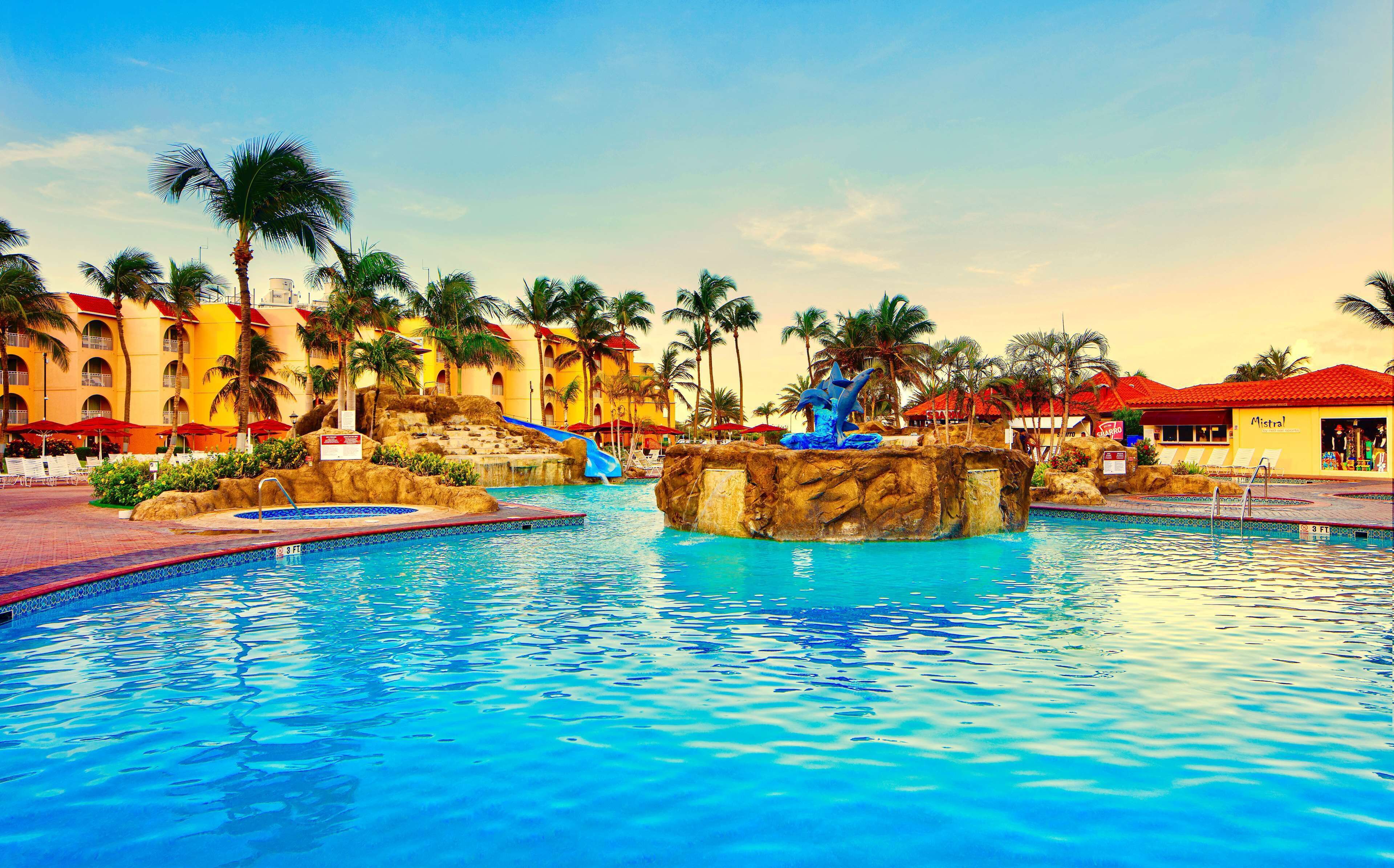 outdoor pool, pool umbrellas, pool loungers