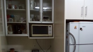 Shared kitchen - Pousada Confort Home Brasília (Brasília)
