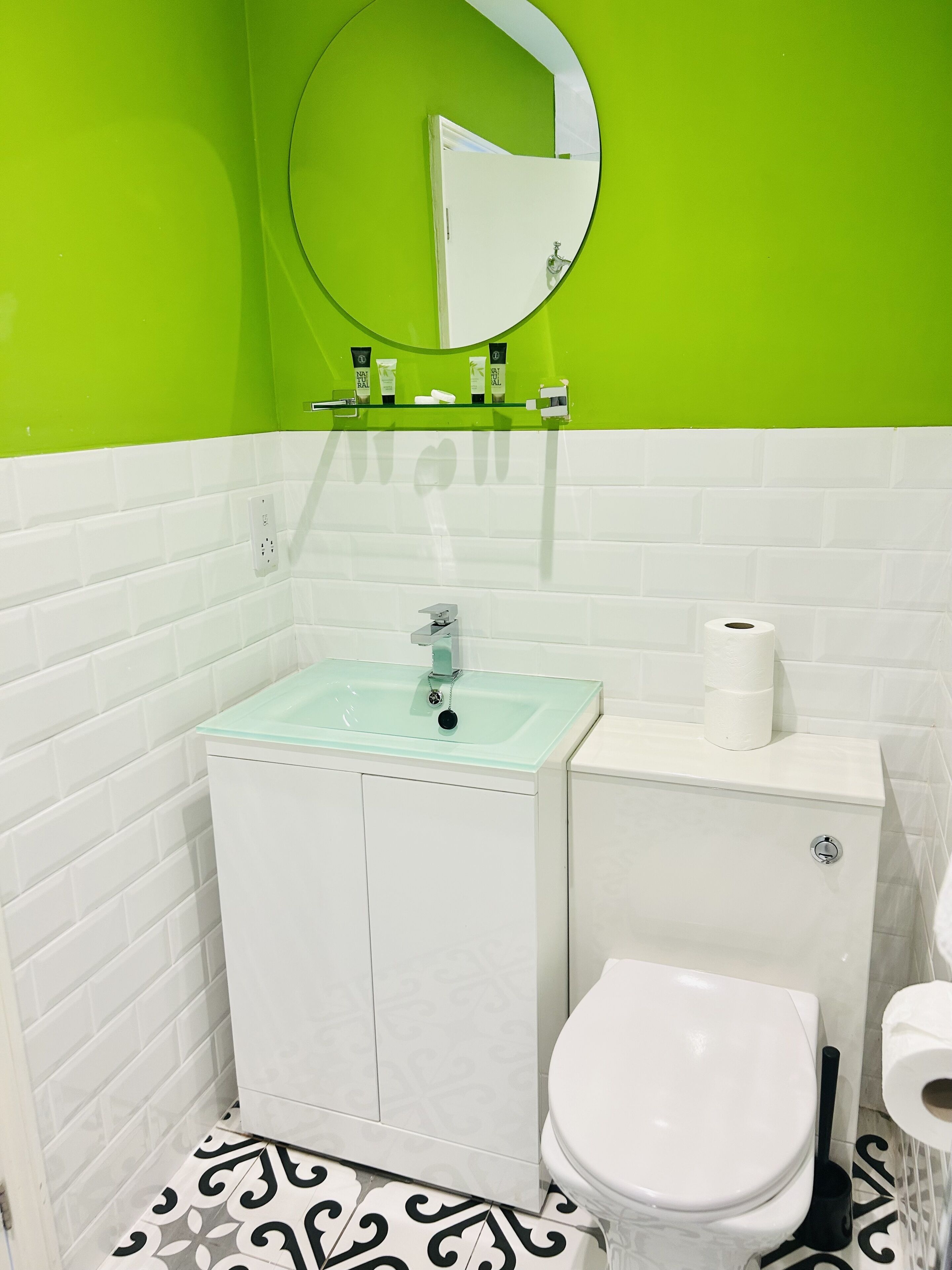 room 8 | bathroom | hair dryer, towels, soap, shampoo