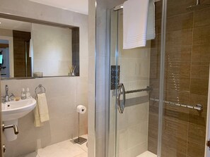 Hair dryer, towels, soap, shampoo
