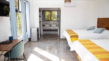 Down comforters, pillowtop beds, in-room safe, desk