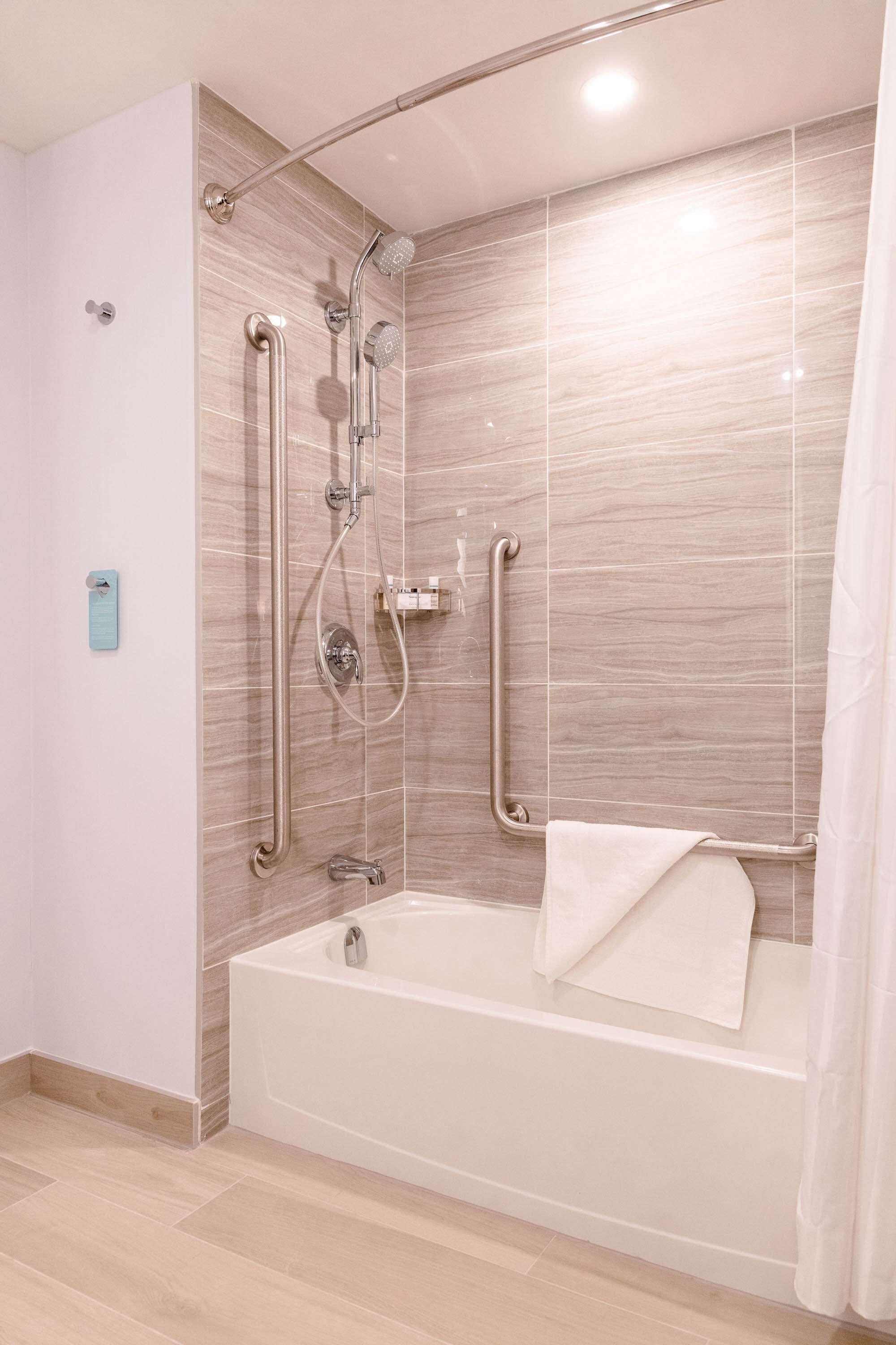 room, 1 king bed, accessible (hearing) | bathroom | free toiletries, hair dryer, towels, soap