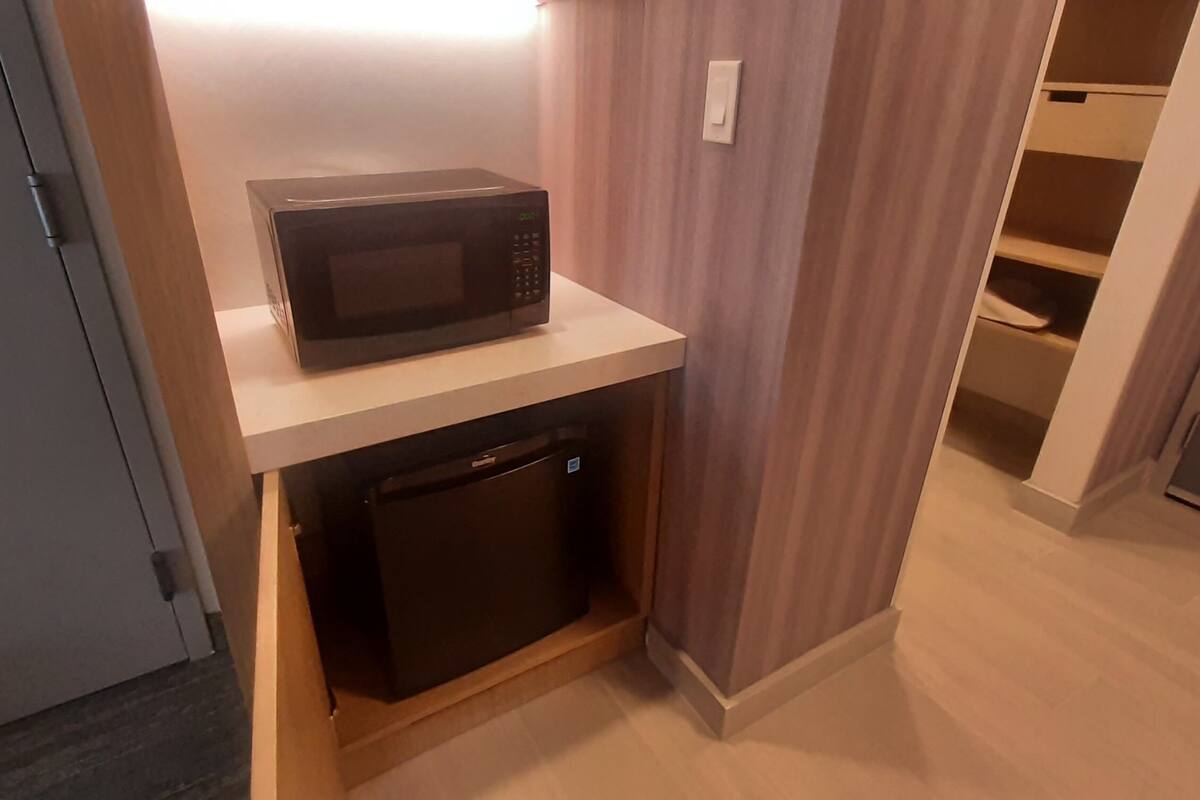 desk, blackout curtains, soundproofing, iron/ironing board