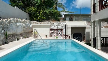 Outdoor pool, sun loungers