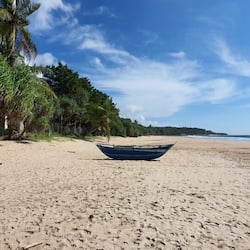 On the beach, white sand, beach towels