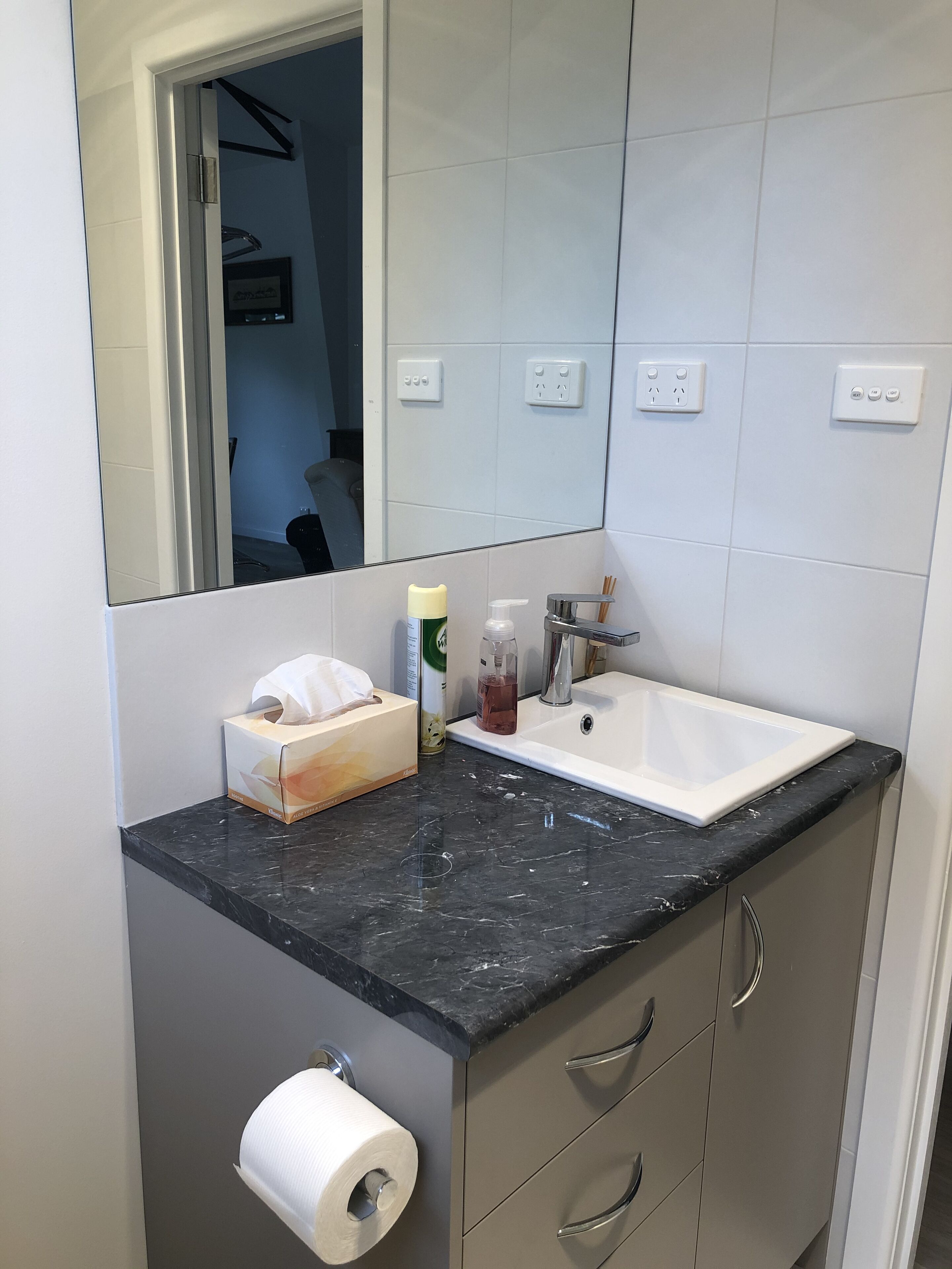 Shower, hair dryer, towels, toilet paper