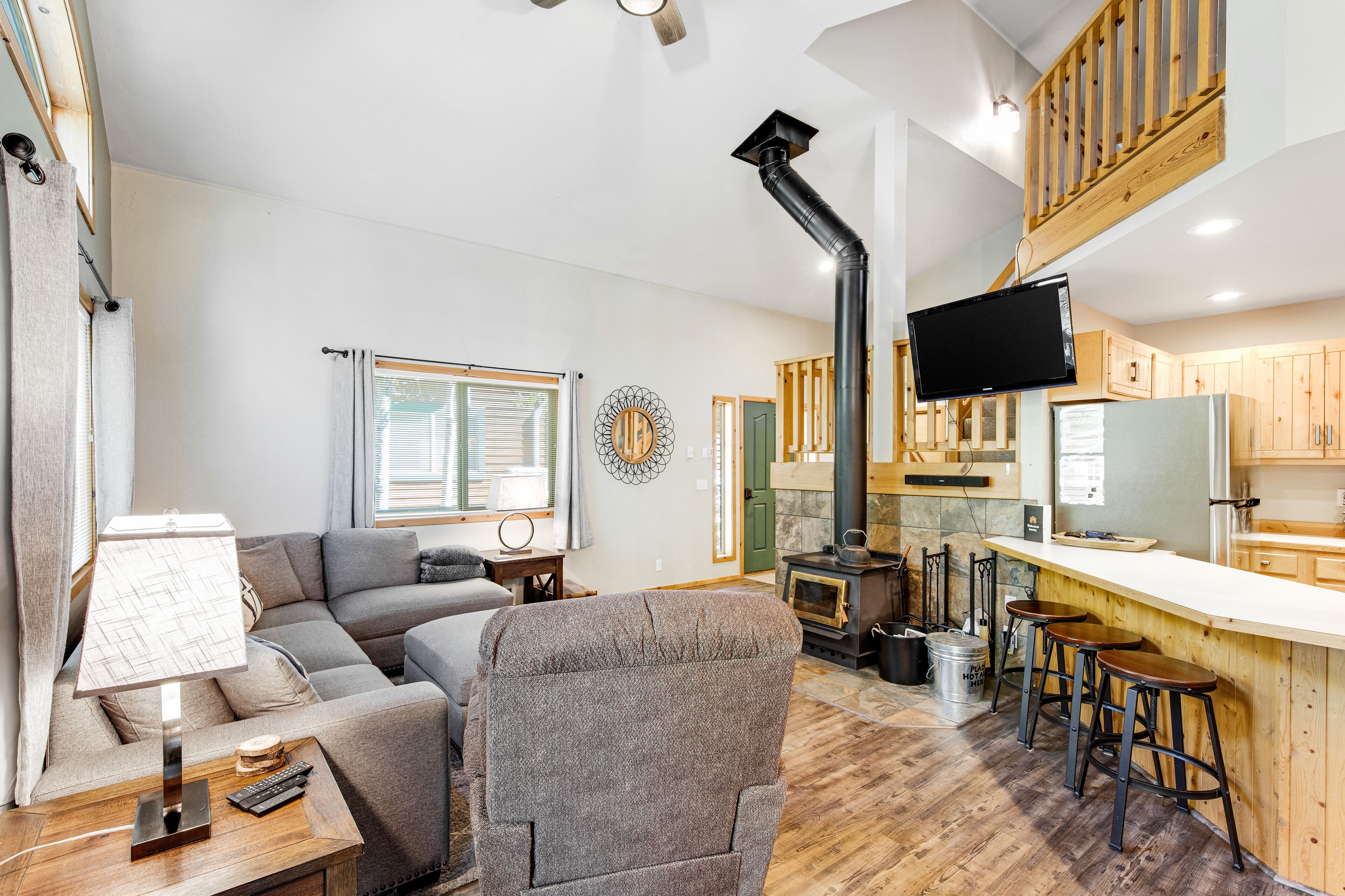 Dog-friendly escape with cozy deck & firepit - access to pool, hot tub & sauna
