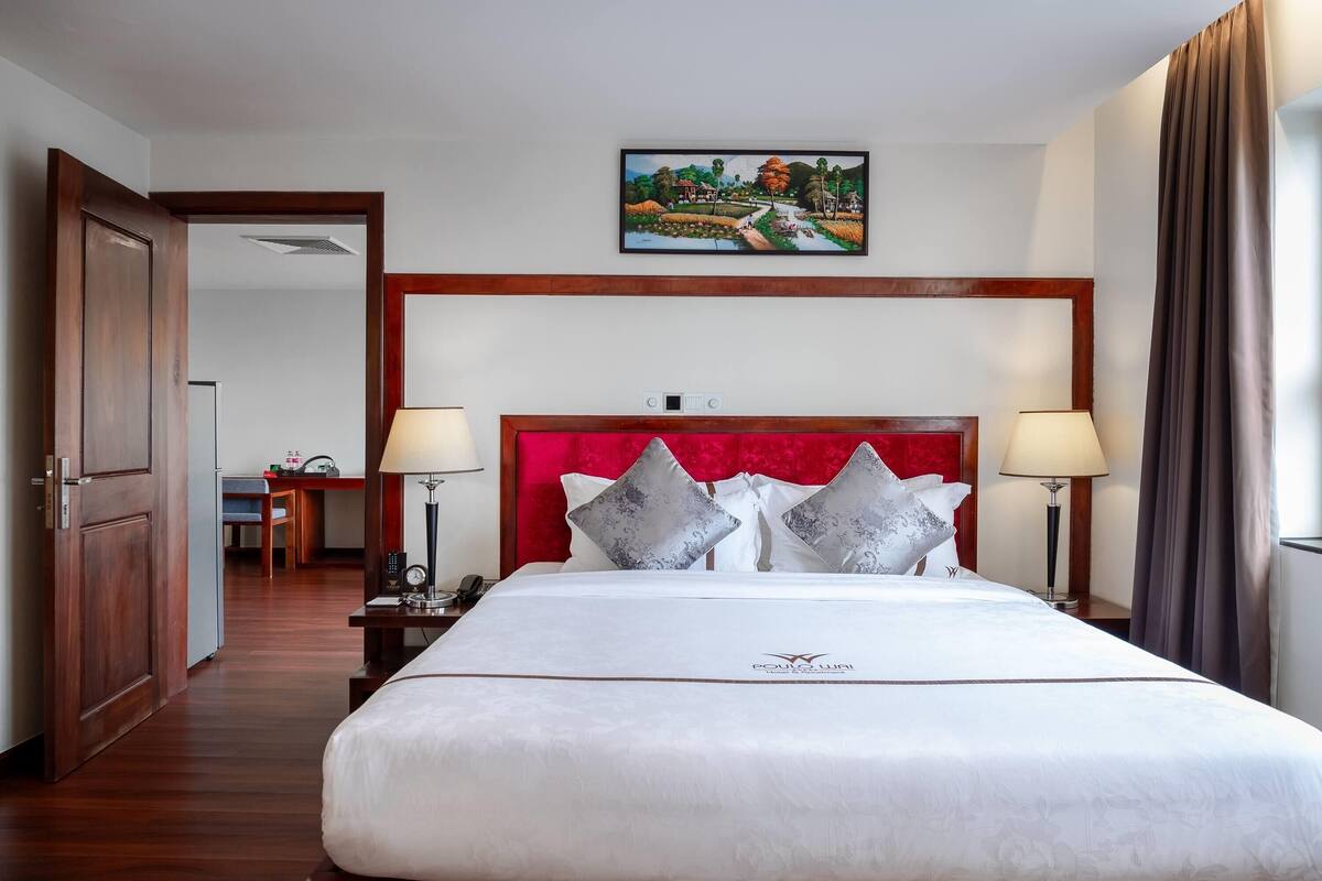 Suite ejecutiva, 1 cama de matrimonio grande | Sábanas de algodón egipcio y ropa de cama de alta calidad