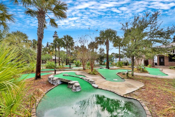 Play a round of golf amidst lush trees and obstacles on our scenic course.