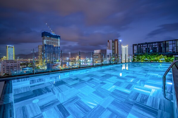 Outdoor pool, open 7:00 AM to 9:00 PM, sun loungers