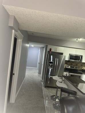 Microwave, dishwasher, coffee/tea maker, cookware/dishes/utensils - Cozy Luxury Home  Edmontom  (Edmonton)