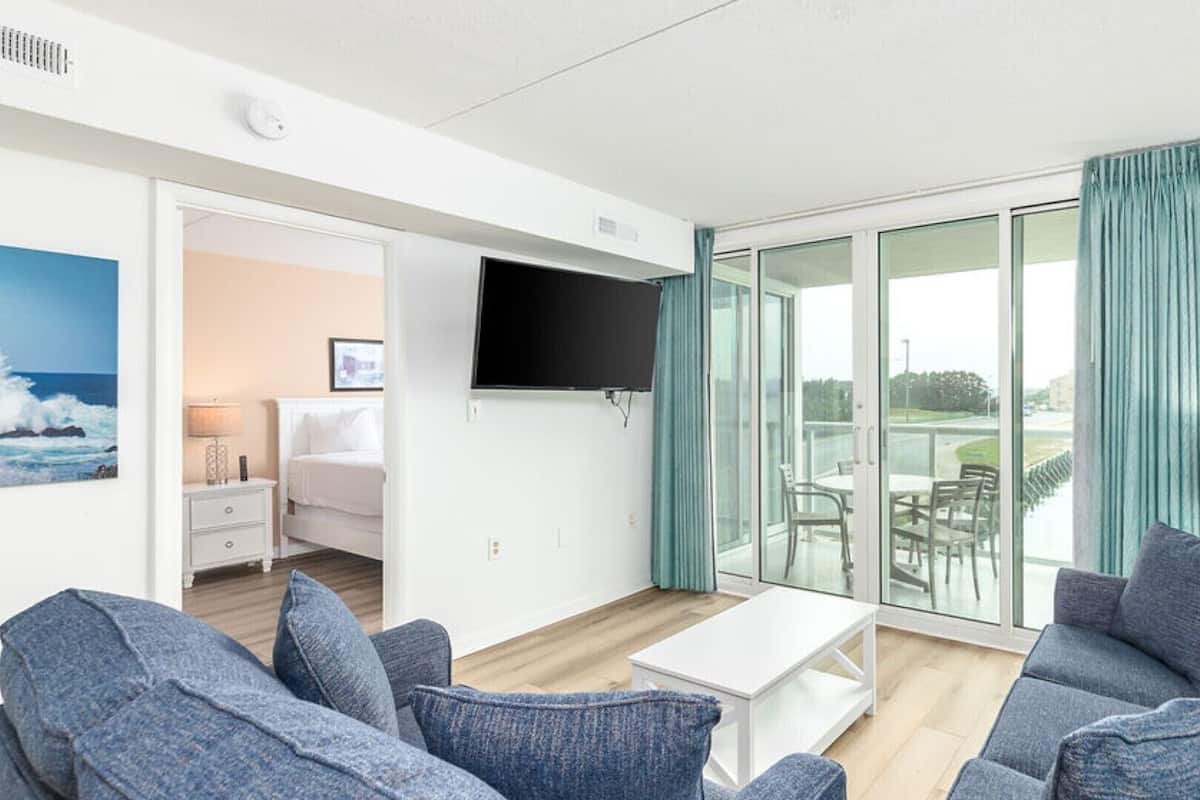 Premium Condo, 3 Bedrooms, Bay View | Living area | 32-inch LCD TV with cable channels, DVD player