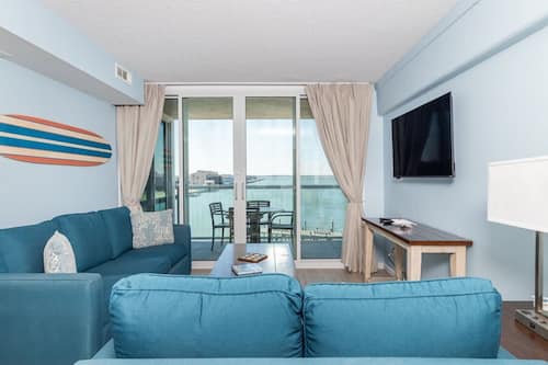 Premium Condo, 2 Bedrooms, Balcony, Bay View | Living area | 32-inch LCD TV with cable channels, DVD player