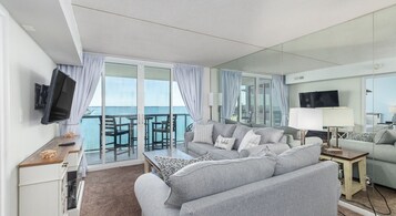 Premium Condo, Balcony, Bay View | Living area | 32-inch LCD TV with cable channels, DVD player