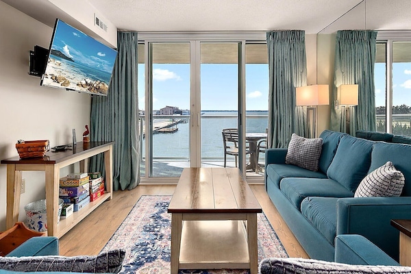Premier Condo, 2 Bedrooms, Bay View | Living area | 32-inch LCD TV with cable channels, DVD player