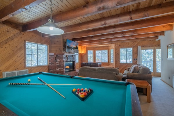 Flat-screen TV, fireplace, foosball